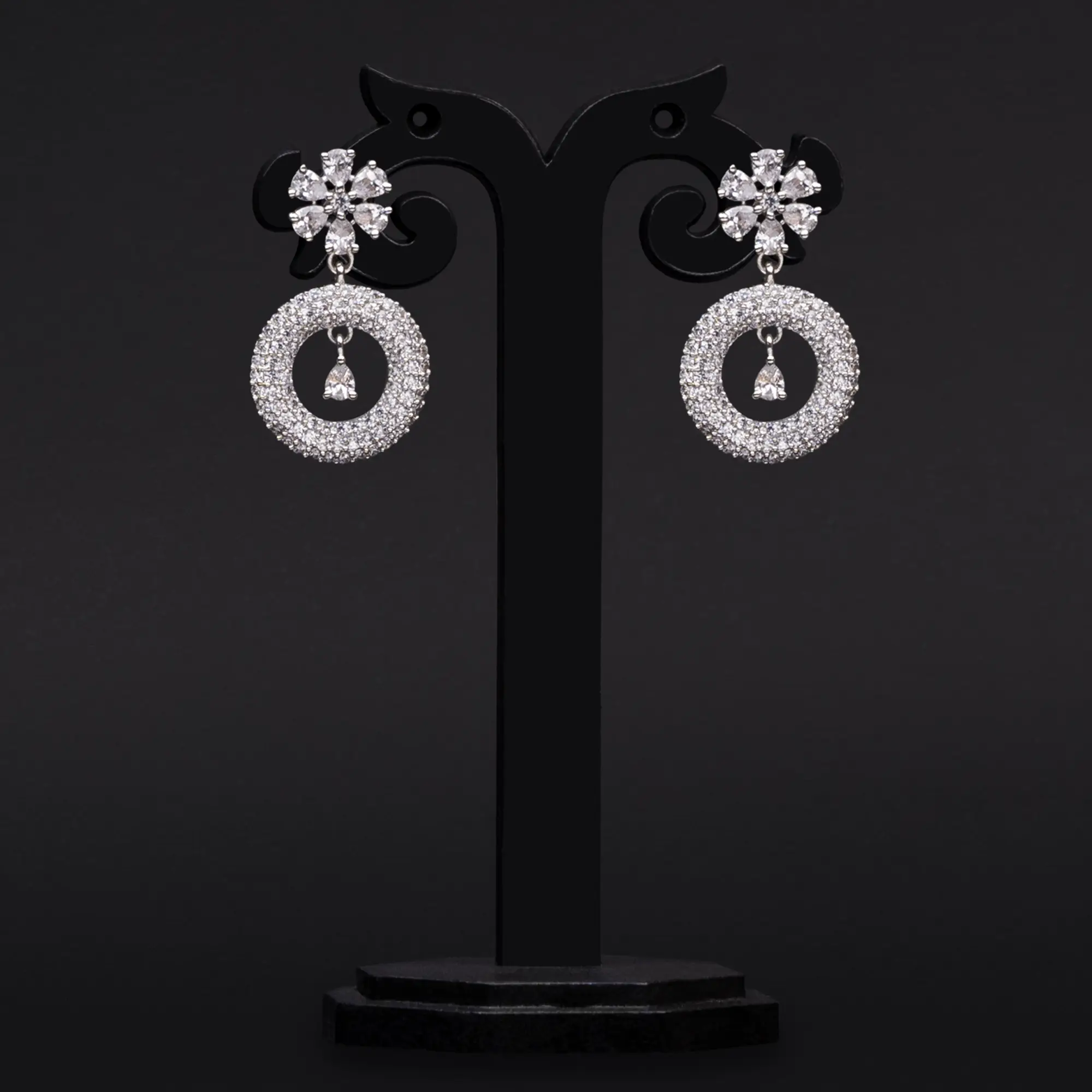 White Floral Motif with American Diamond Studded Rhodium-Plated Earrings