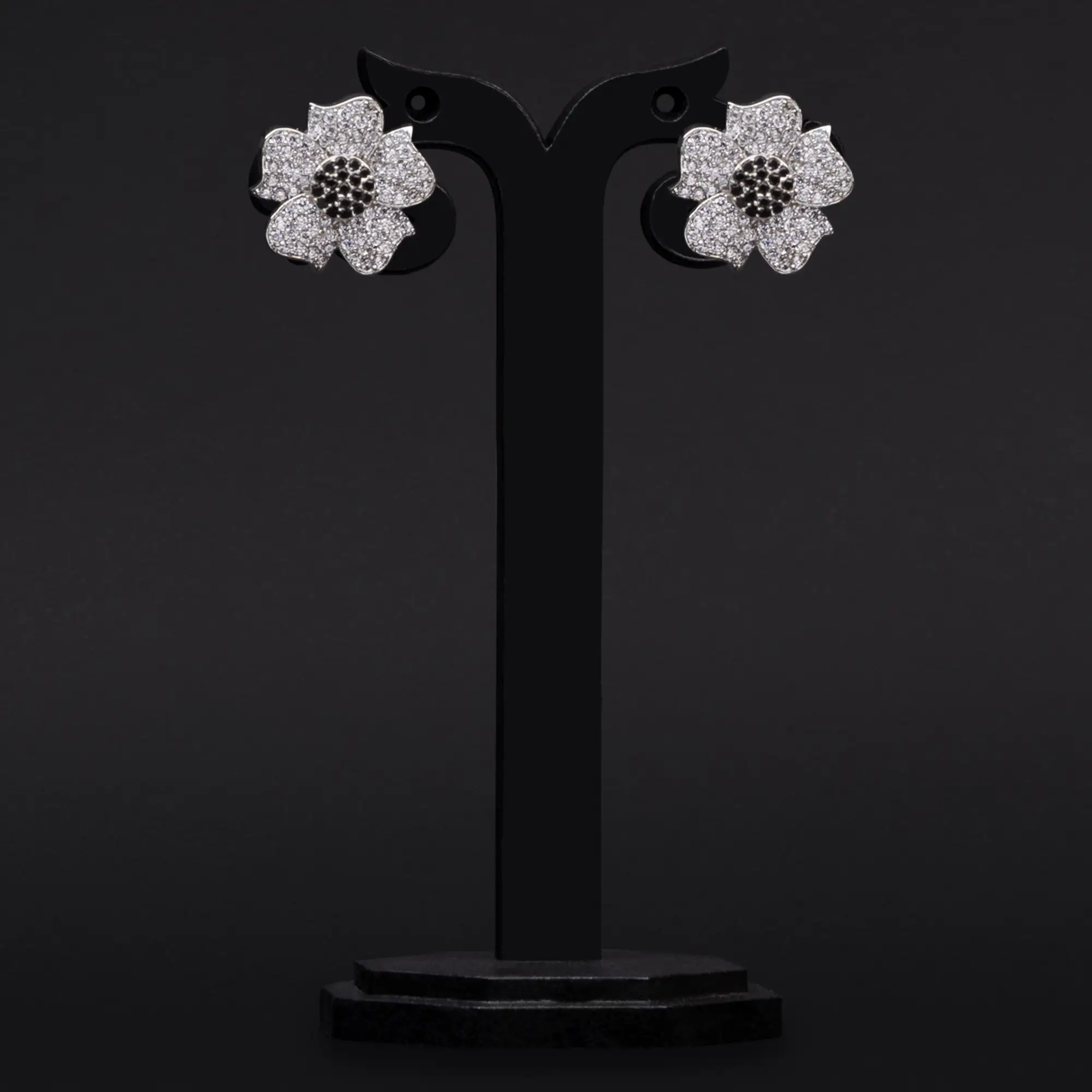 Floral Design adorned with American Diamond and Hint of Black Stones with Rhodium-Plating