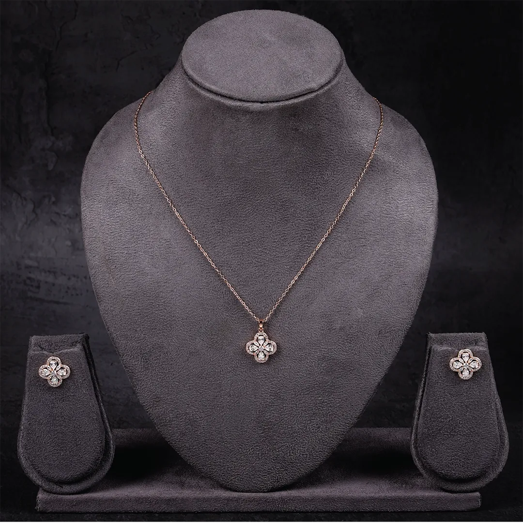 Floral Shaped Pendant adorned with American Diamonds Set with Chain and Earrings in Rose Gold
