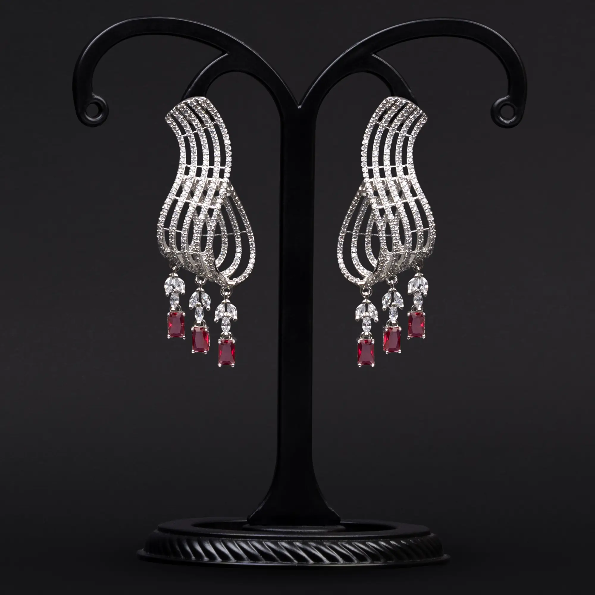 Sparkling Danglers Rhodium-Plated and Adorned with American Diamonds and Red Stones