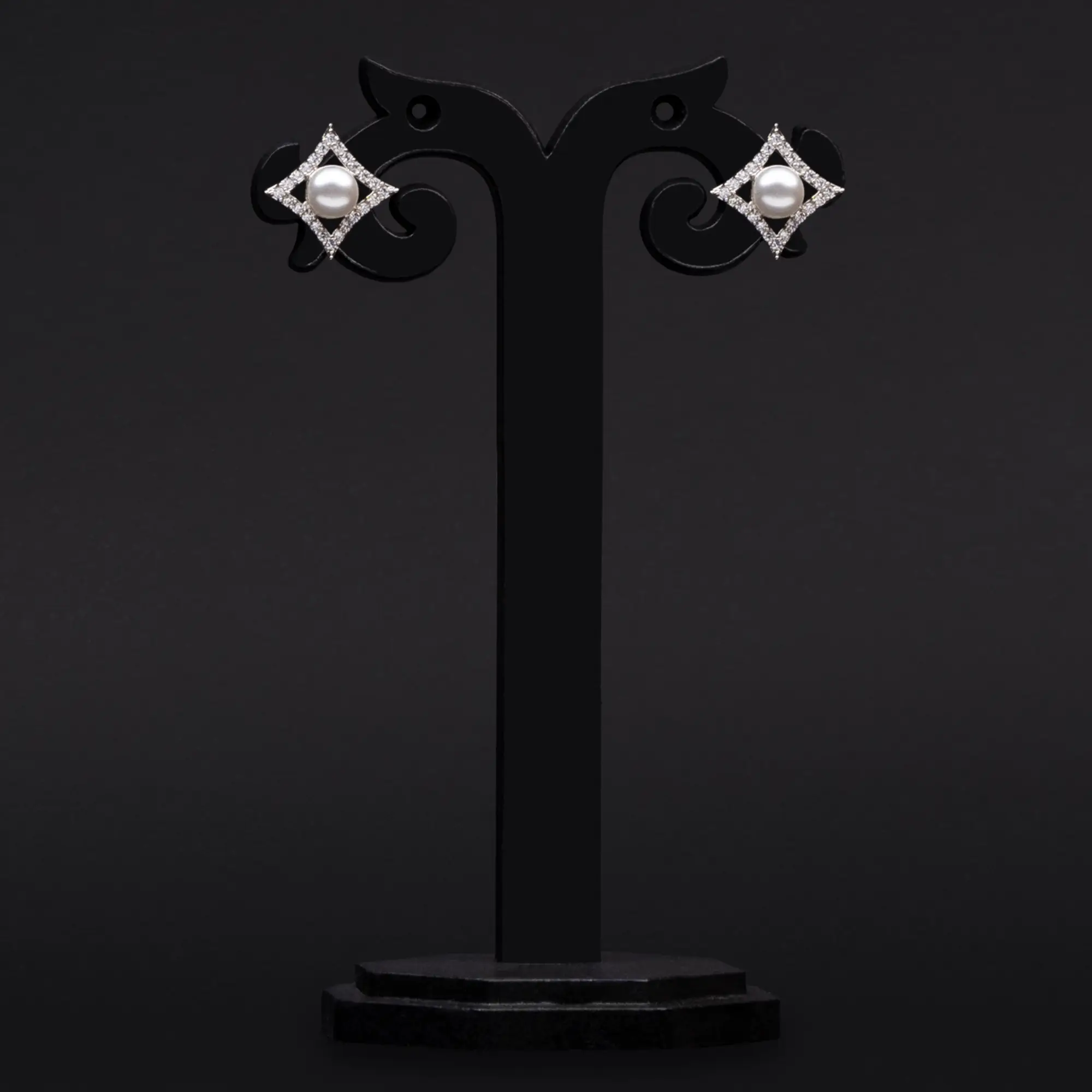 Rhodium Plated Pearl Tops Adorned with American Diamond Earrings